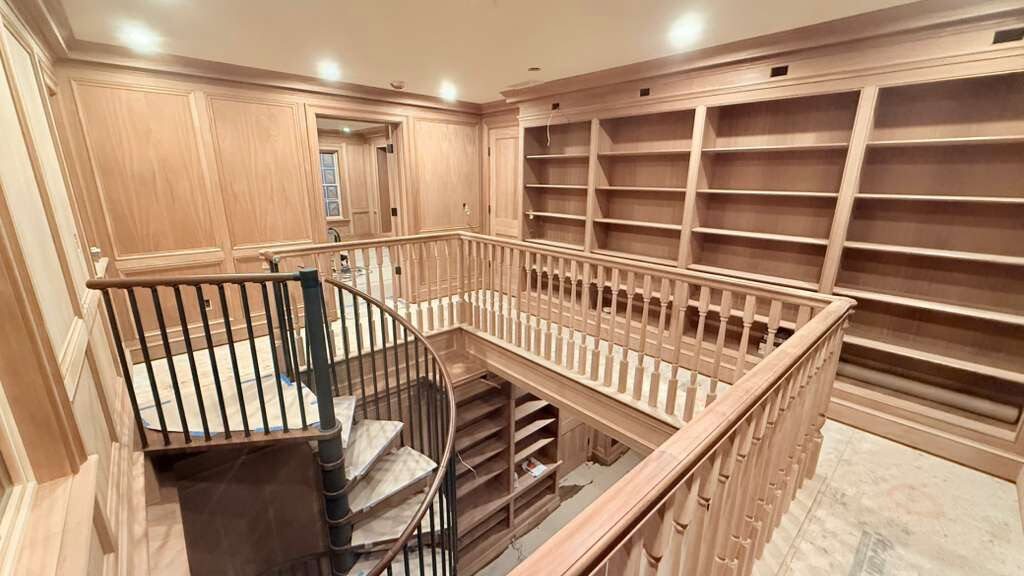 Floor-to-ceiling custom library built-ins