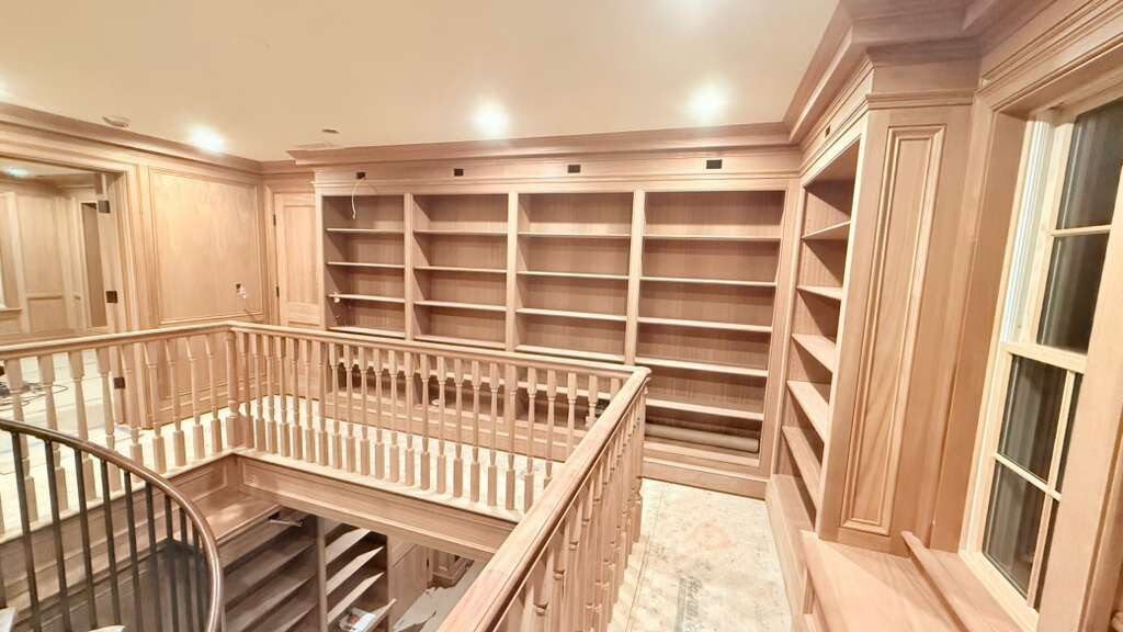 Upper level custom millwork and railing